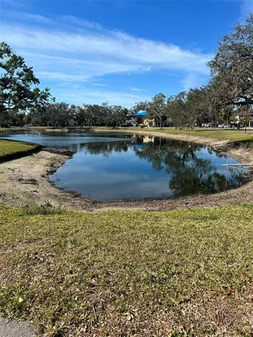 a view of a lake with a city