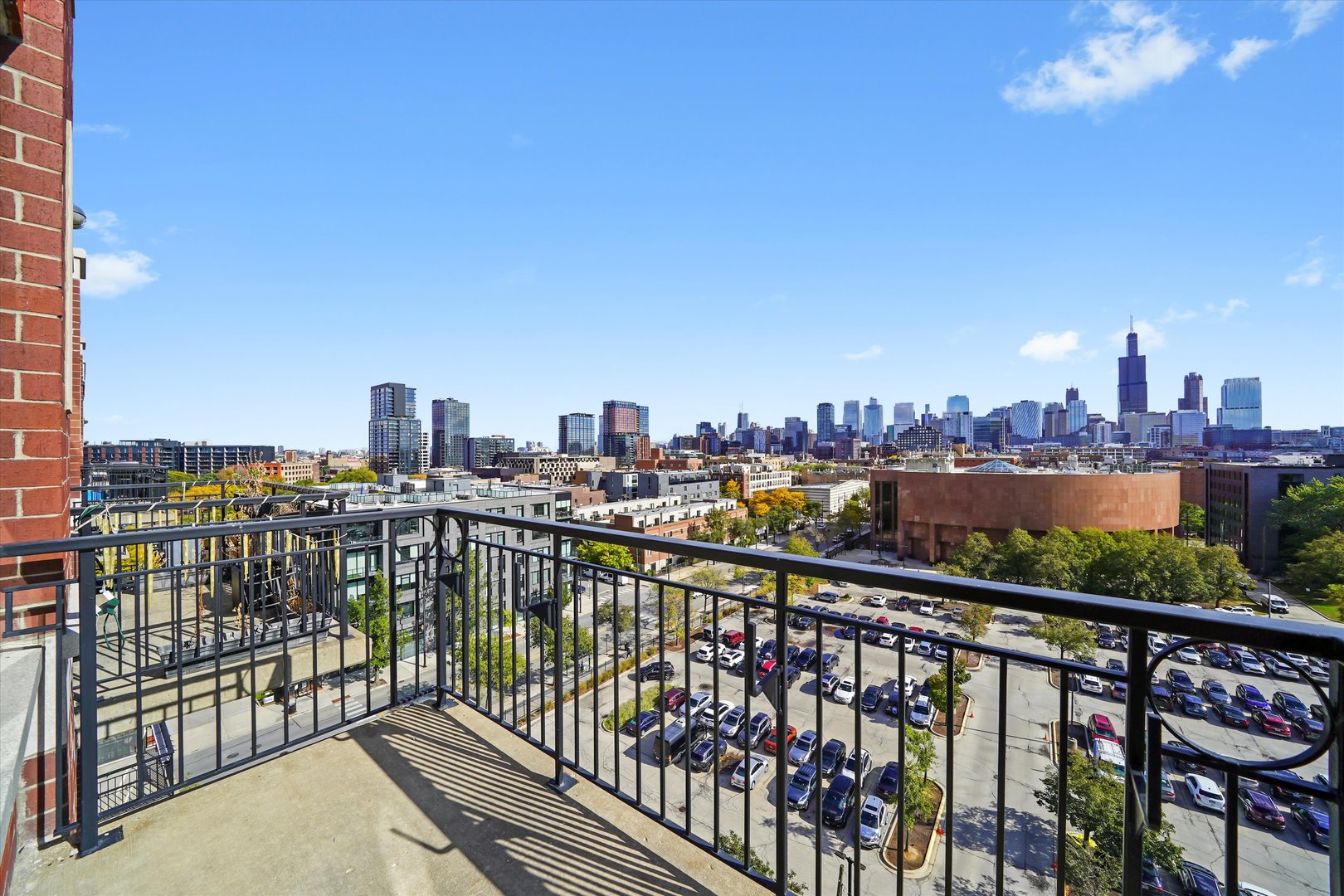 6 South Laflin Street, Unit 910 Chicago, IL 60607 - Photo 6 of 23 a view of city from a balcony