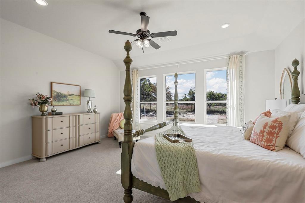 147 Rj Smith Drive Boyd, TX 76023 - Photo 10 of 15 a bed room with a bed and a window