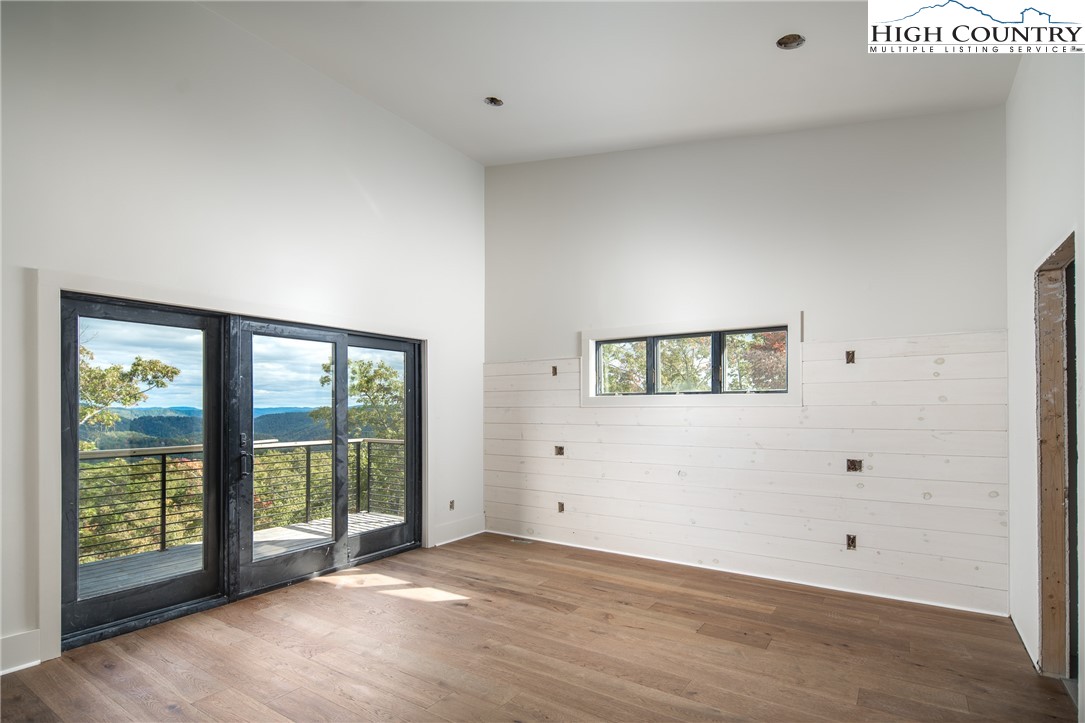 140 Lobelia Lane Boone, NC 28607 - Photo 11 of 31 an empty room with windows