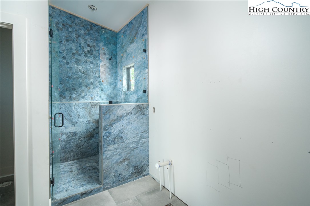 140 Lobelia Lane Boone, NC 28607 - Photo 14 of 31 a bathroom with a shower