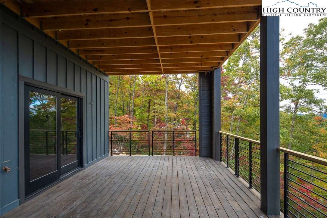 140 Lobelia Lane Boone, NC 28607 - Photo 19 of 31 a view of a porch with wooden floor