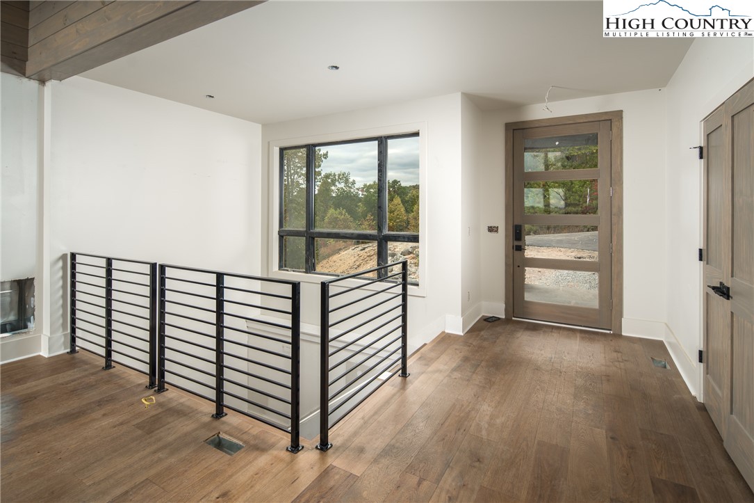 140 Lobelia Lane Boone, NC 28607 - Photo 2 of 31 a view of a room with wooden floor and a window