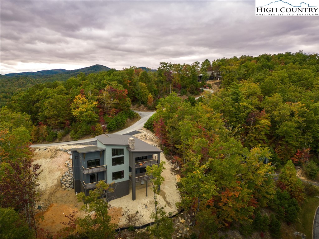 140 Lobelia Lane Boone, NC 28607 - Photo 28 of 31 a aerial view of a house with a yard