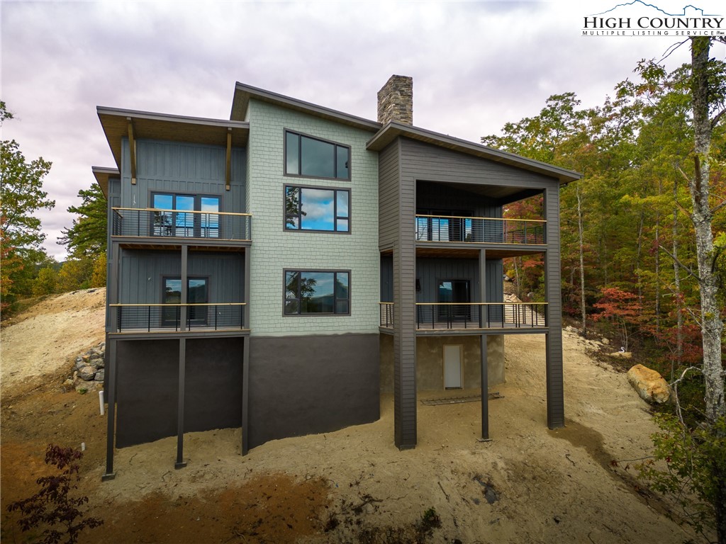 140 Lobelia Lane Boone, NC 28607 - Photo 29 of 31 a view of a house with a balcony