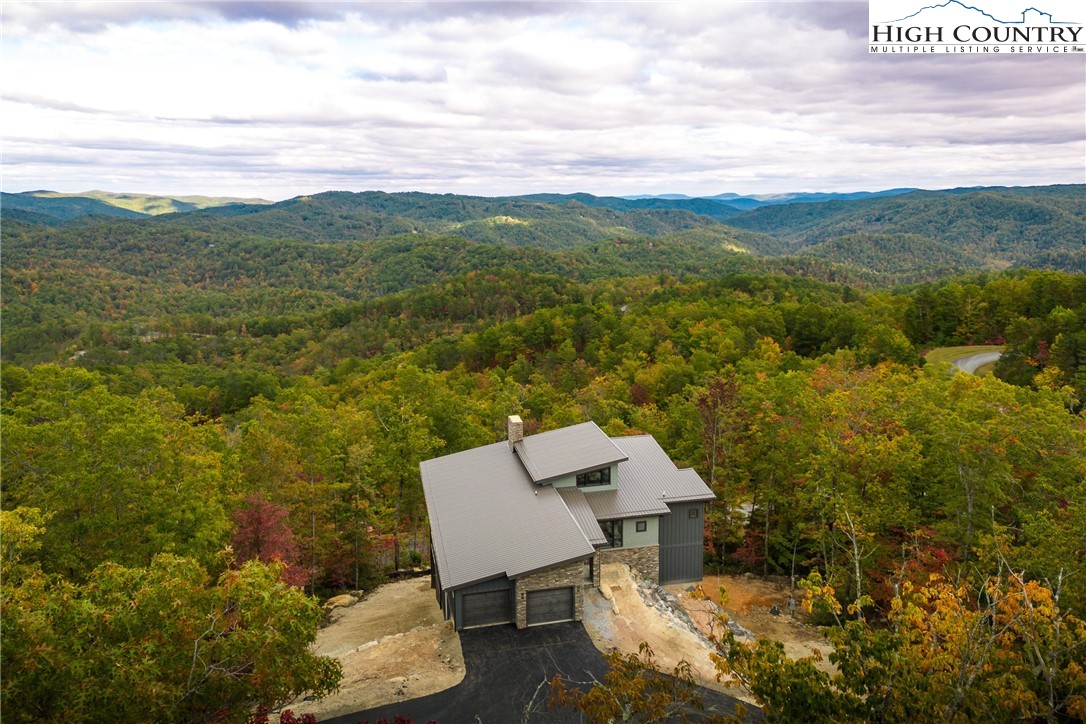 140 Lobelia Lane Boone, NC 28607 - Photo 31 of 31 a view of a terrace with a table and chairs