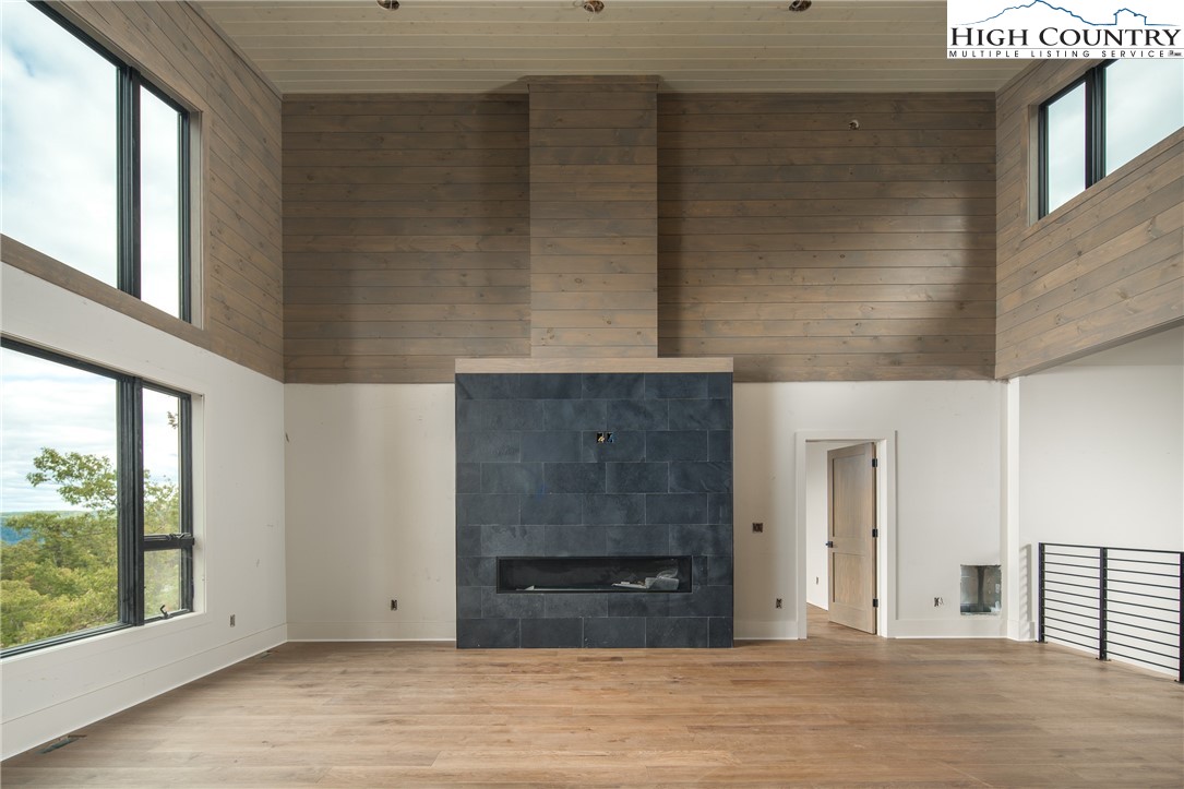 140 Lobelia Lane Boone, NC 28607 - Photo 4 of 31 a view of empty room with wooden floor and fan