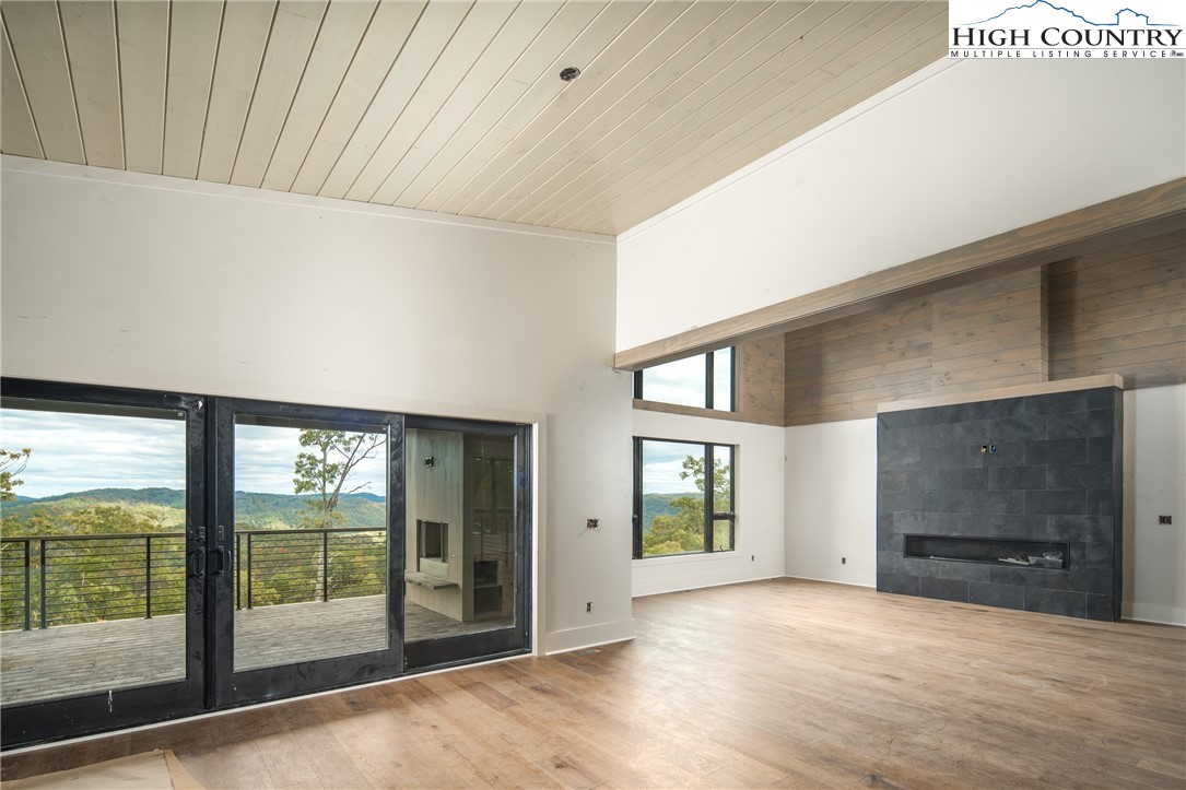140 Lobelia Lane Boone, NC 28607 - Photo 6 of 31 a view of an empty room with a window