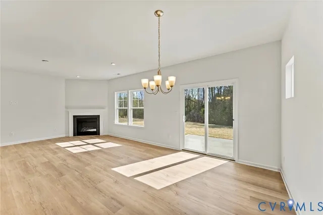 a view of a kitchen with furniture and a fireplace