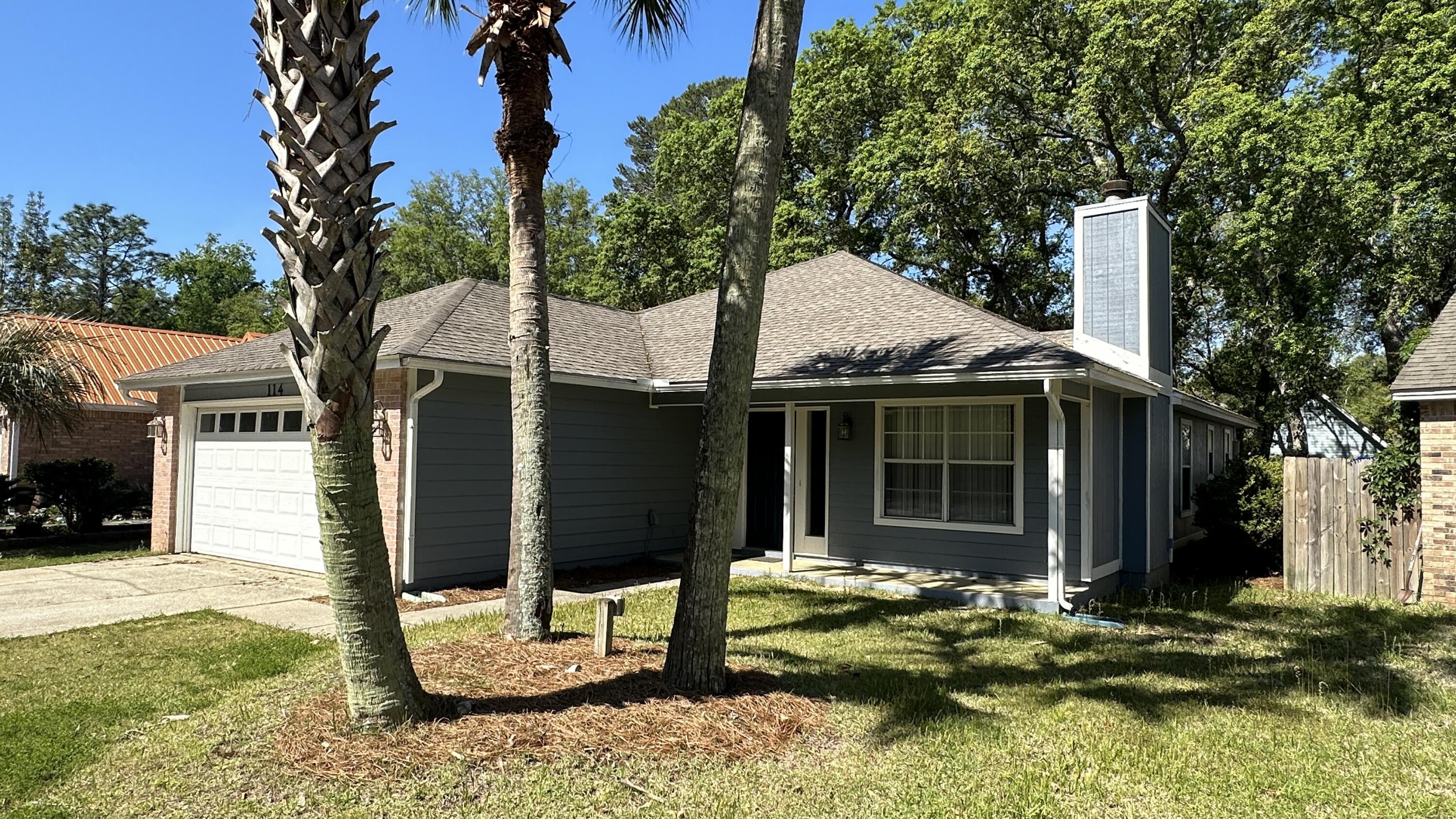 114 Wright Circle Niceville, FL 32578 - Photo 15 of 17 a view of a house with yard and sitting area