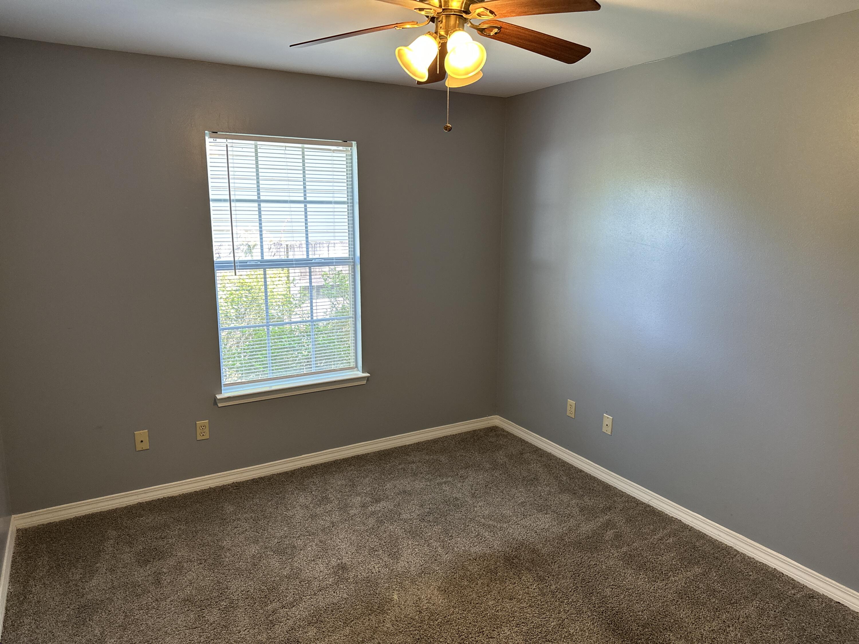 114 Wright Circle Niceville, FL 32578 - Photo 9 of 17 an empty room with a window