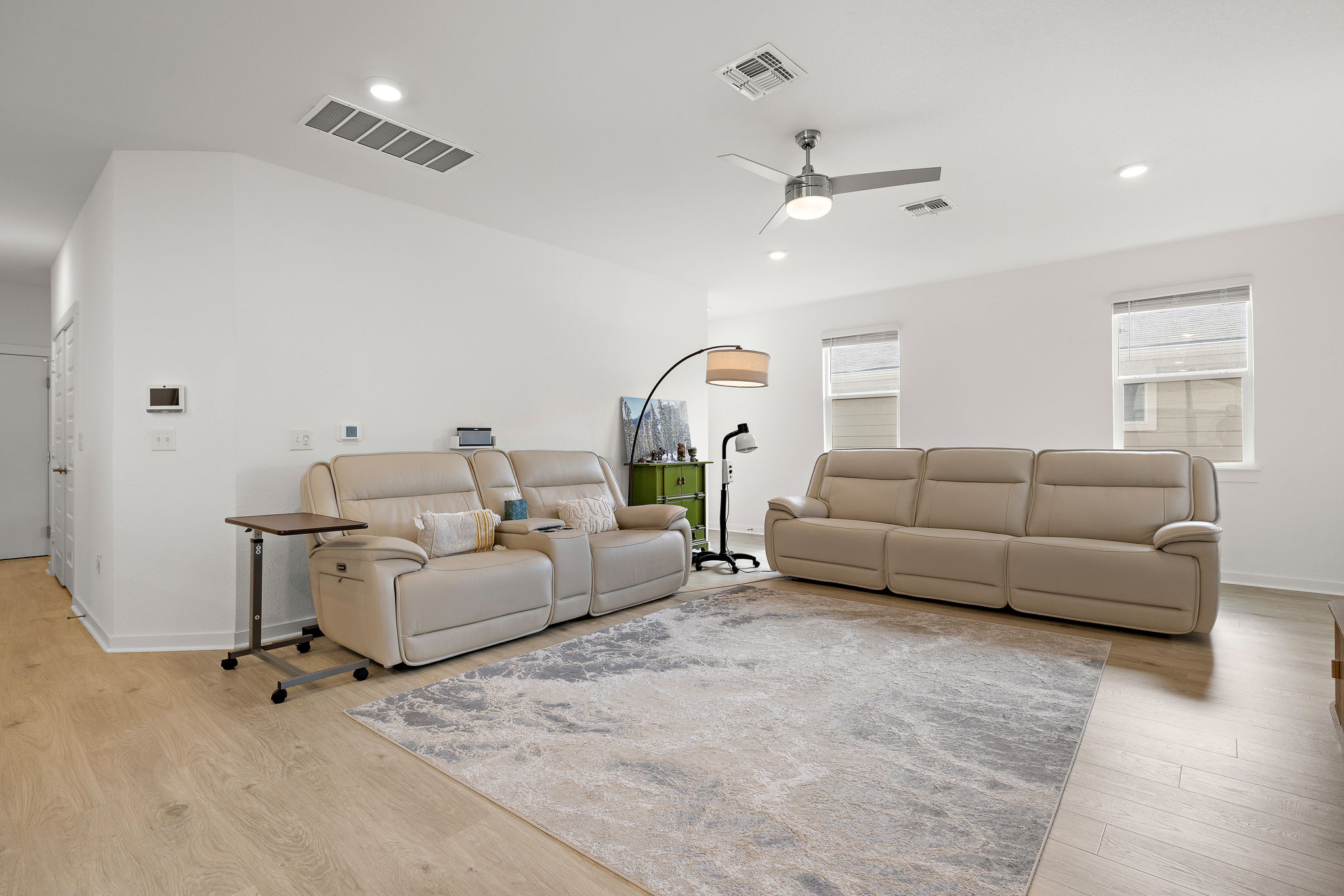 2313 Ranier Court Austin, TX 78754 - Photo 6 of 22 a living room with furniture and a chandelier