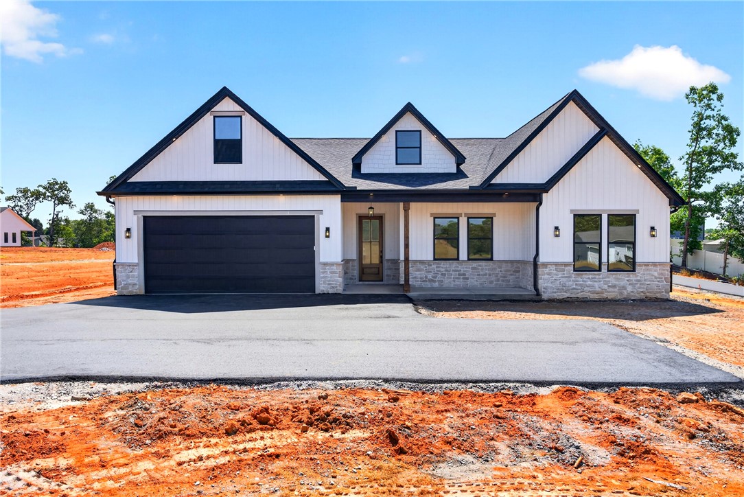 416 Blume Road Anderson, SC 29625 - Photo 1 of 29 A newly constructed residence showcasing crisp white siding, dark trim, and a prominent attached garage.