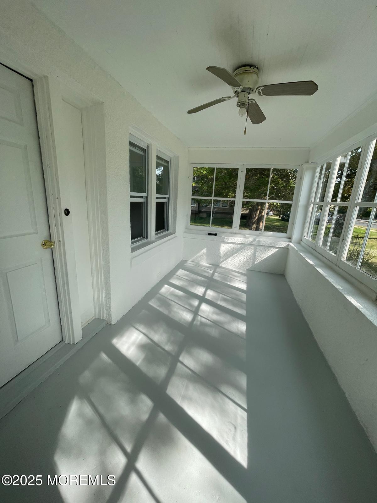 399 Park Avenue, Unit 1 Oakhurst, NJ 07755 - Photo 12 of 12 a view of an empty room with a window