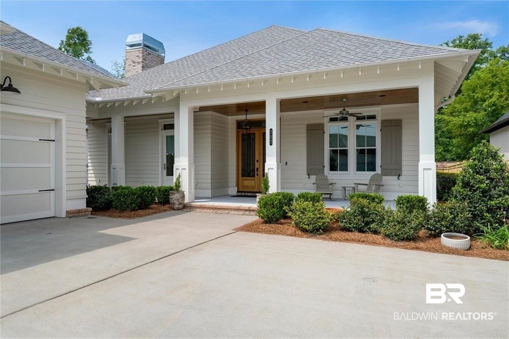 707 Cardamel Court Fairhope, AL 36532 - Photo 39 of 40 Property entrance featuring a porch and a garage