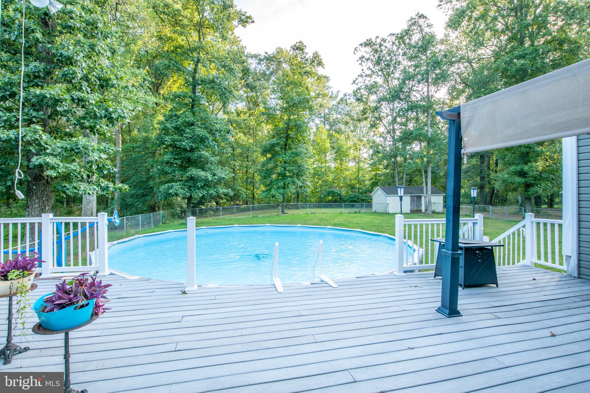 758 Jackson Ditch Road Harrington, DE 19952 - Photo 21 of 33 Deck with Pool