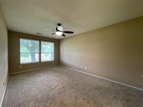 1100 Inland Lane McKinney, TX 75072 - Photo 17 of 24 an empty room with a empty space and windows