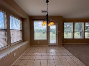 1100 Inland Lane McKinney, TX 75072 - Photo 18 of 24 a view of an empty room with a window