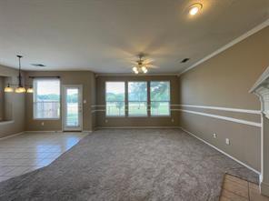 1100 Inland Lane McKinney, TX 75072 - Photo 22 of 24 an empty room with a empty space and windows