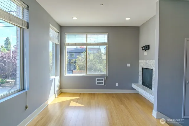 a kitchen with kitchen island a sink and refrigerator