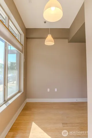 a view of an empty room with a window
