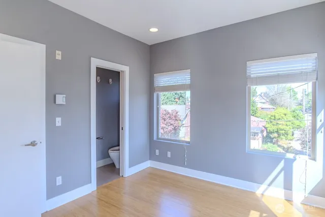 a view of an empty room and window