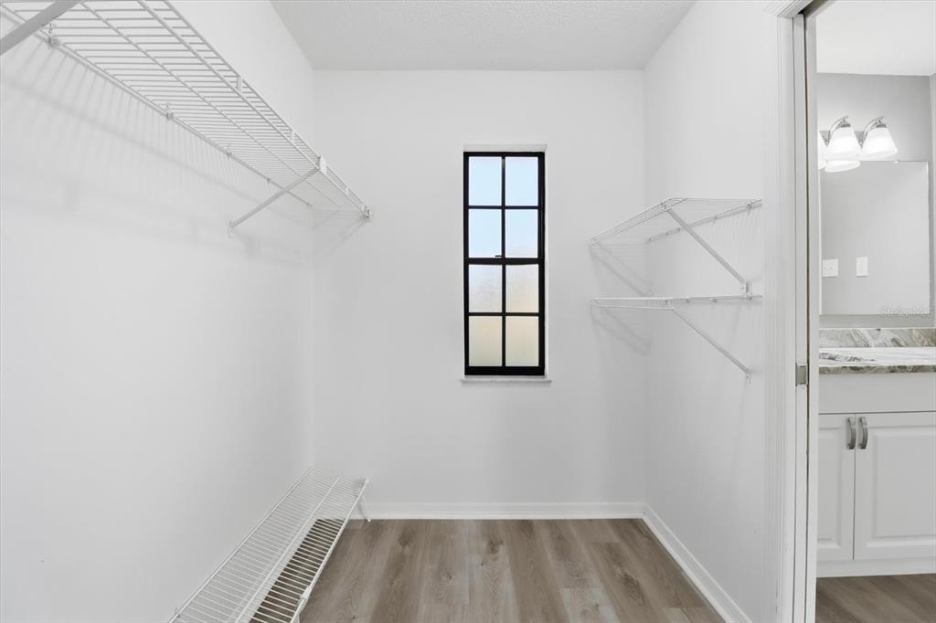 10256 East Pike Drive Inverness, FL 34450 - Photo 14 of 37 a view of a room with racks on the wall