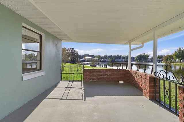 a view of balcony with furniture