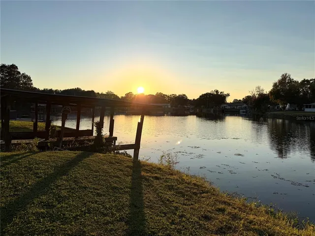 a view of a lake with a mountain in the background
