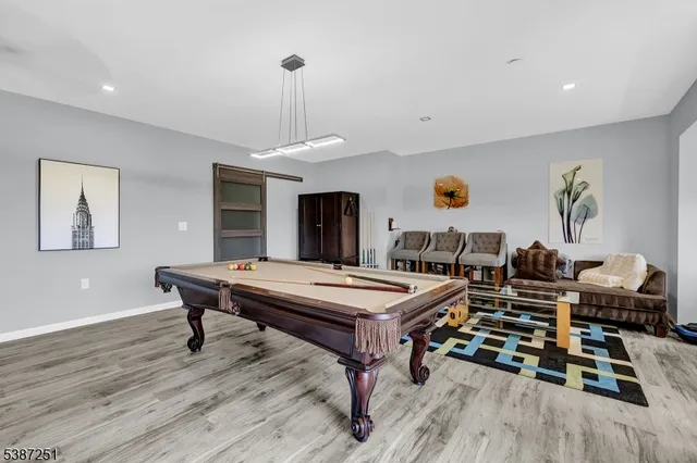 a room with furniture and wooden floor