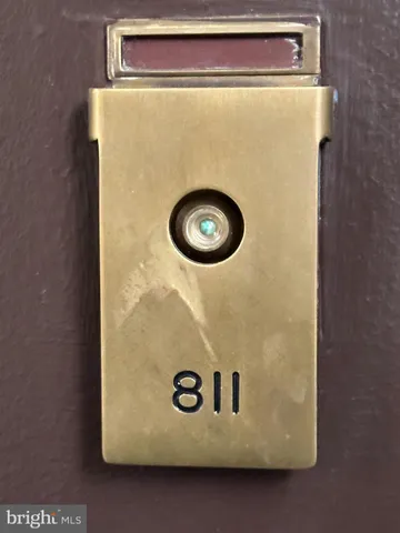 a kitchen with a refrigerator sink stove and cabinets