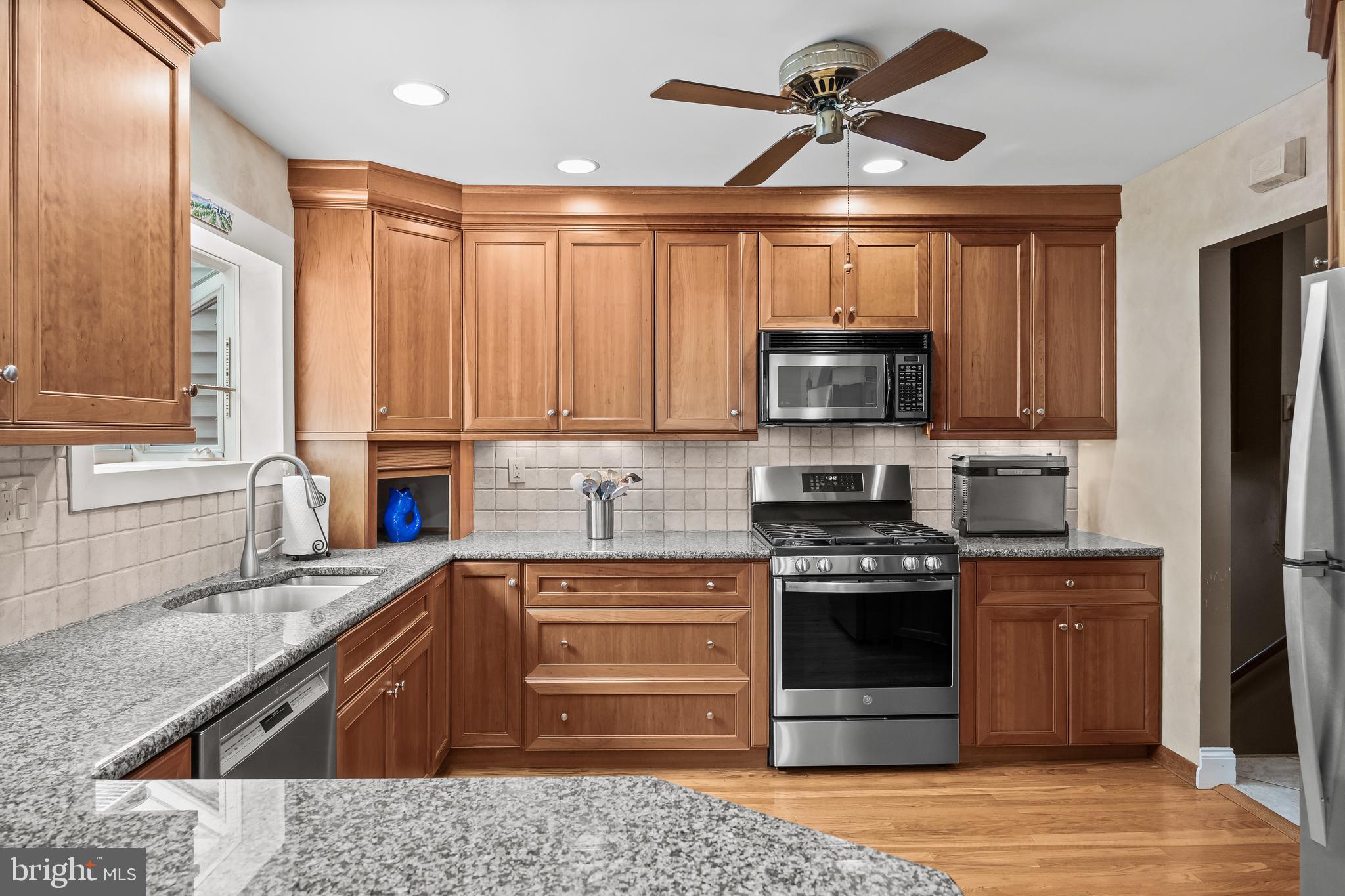 47 Clemson Road Cherry Hill, NJ 08034 - Photo 12 of 50 a kitchen with stainless steel appliances granite countertop a stove and a sink