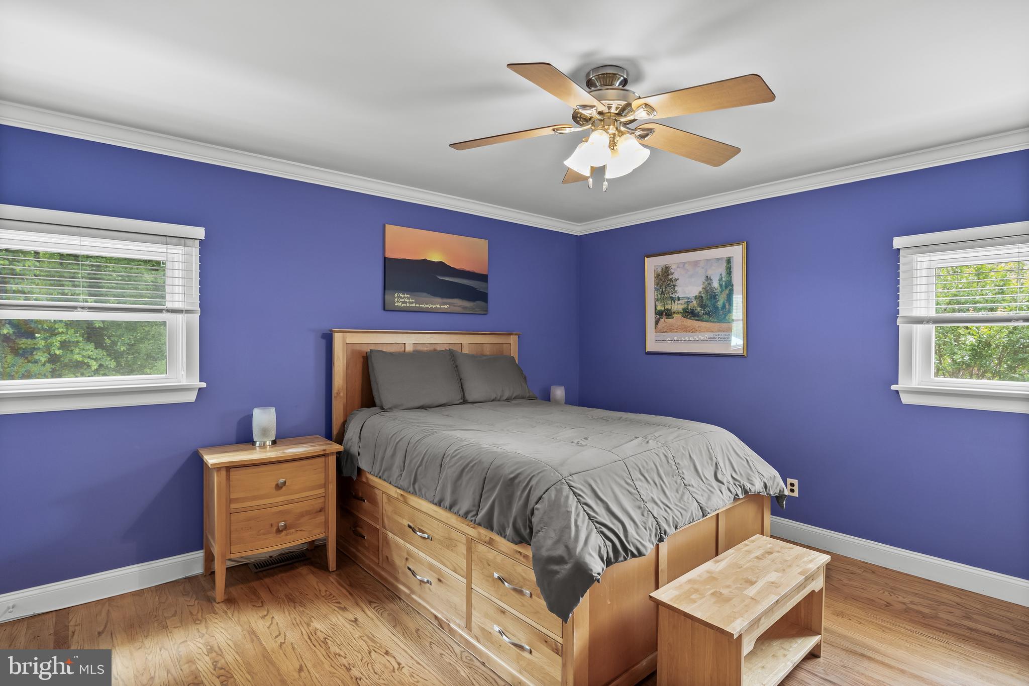 47 Clemson Road Cherry Hill, NJ 08034 - Photo 17 of 50 a bedroom with a bed and a chandelier