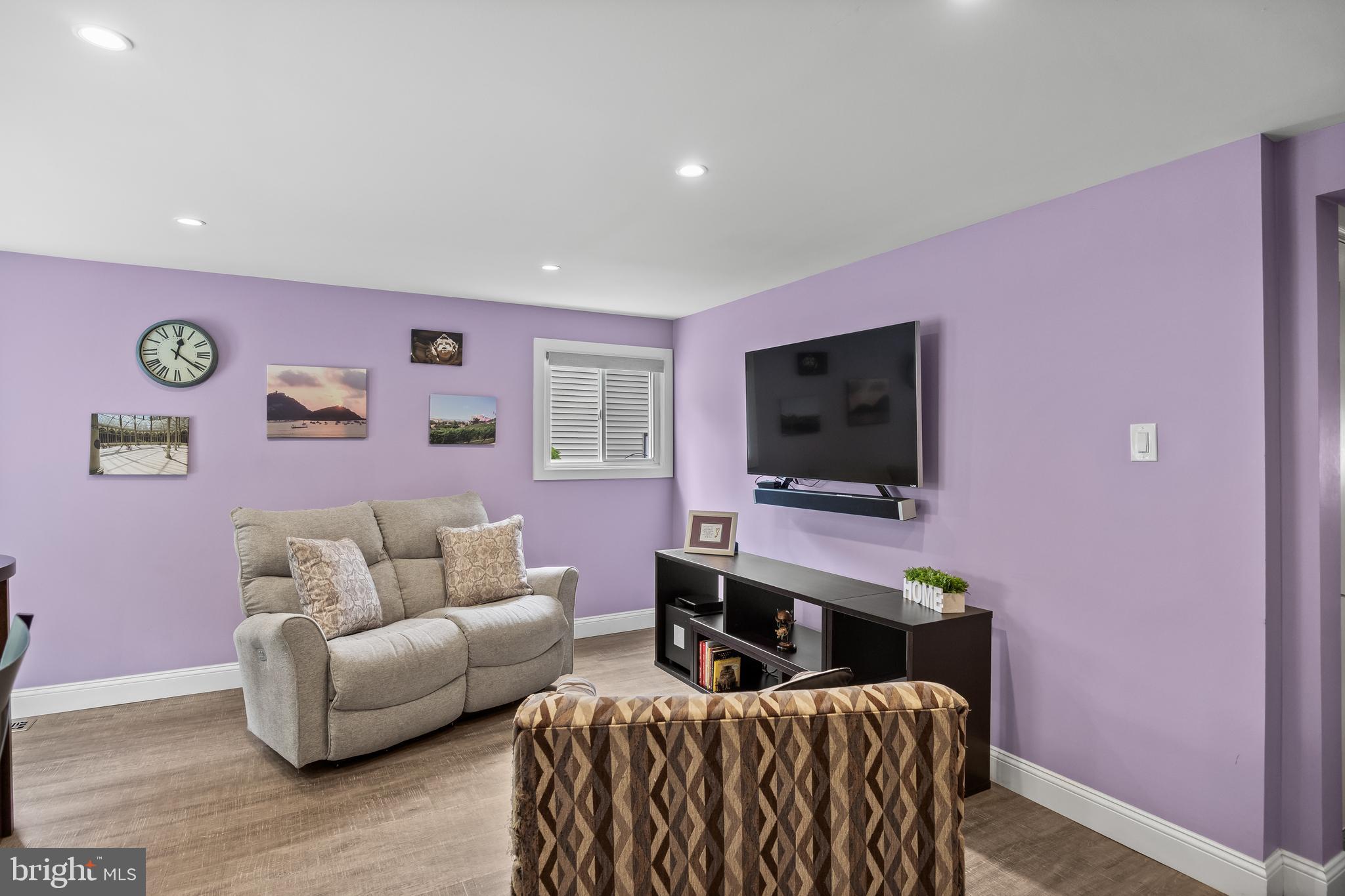 47 Clemson Road Cherry Hill, NJ 08034 - Photo 27 of 50 a living room with furniture and a flat screen tv