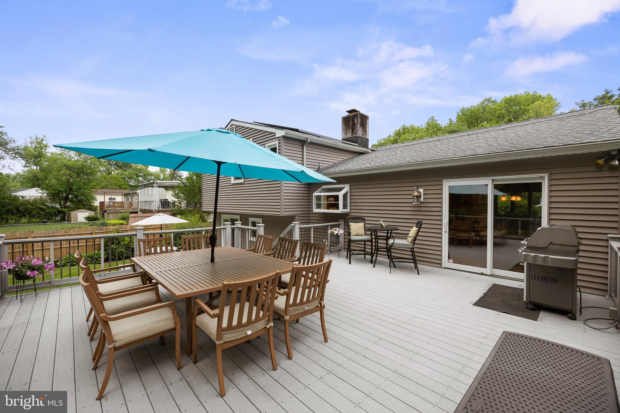 47 Clemson Road Cherry Hill, NJ 08034 - Photo 39 of 50 an outdoor space with furniture and umbrella