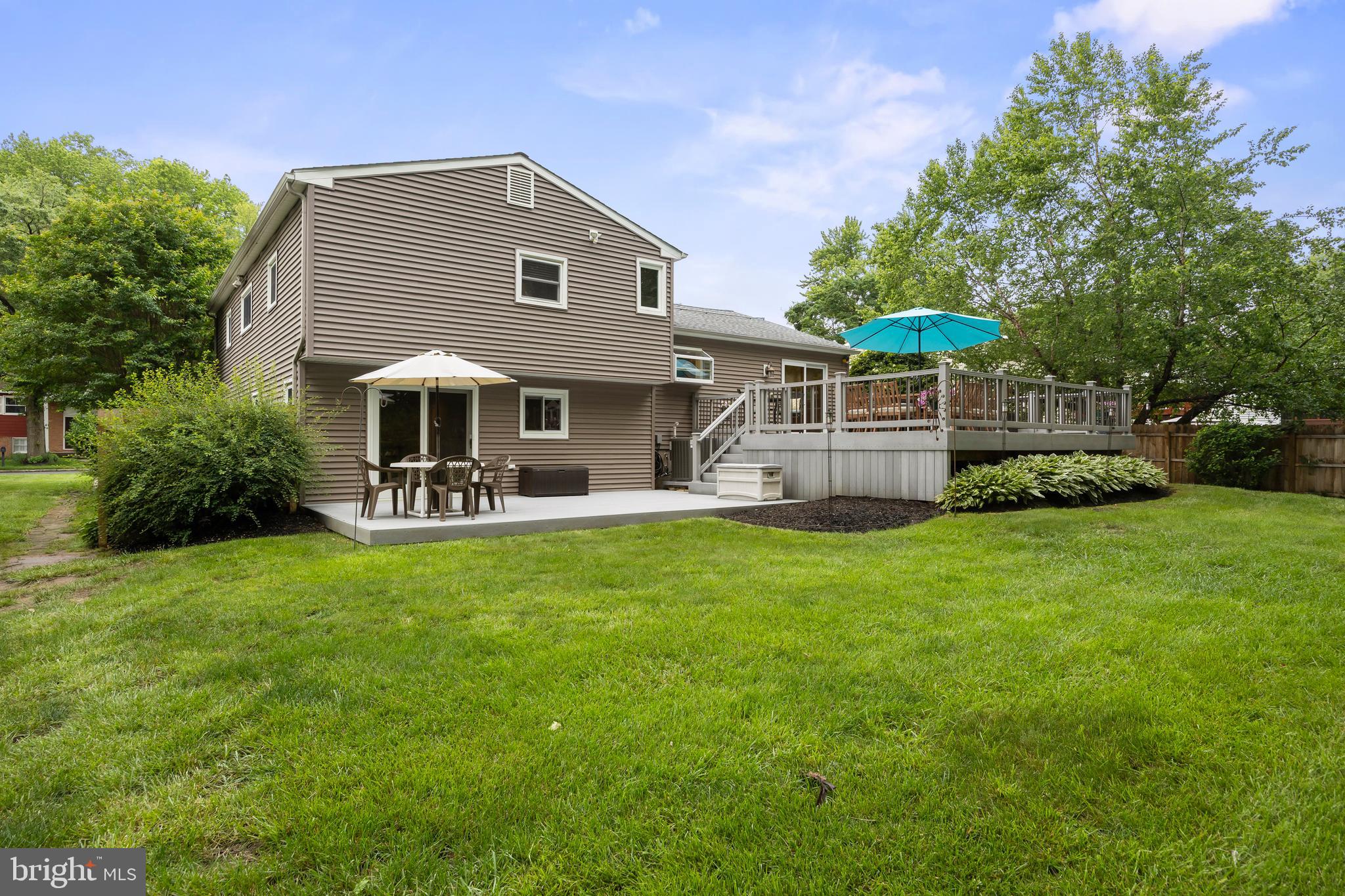 47 Clemson Road Cherry Hill, NJ 08034 - Photo 5 of 50 a front view of a house with a yard table and chairs