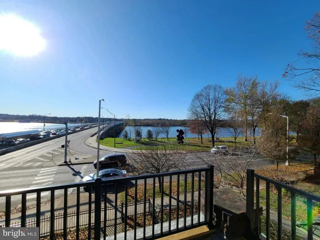 a view of swimming pool from a balcony