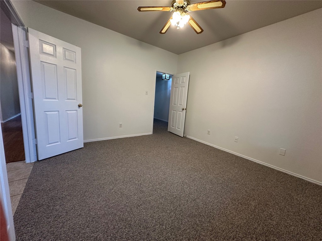 3412 Napa Valley Bend Leander, TX 78641 - Photo 4 of 27 Unfurnished bedroom featuring carpet floors and a ceiling fan