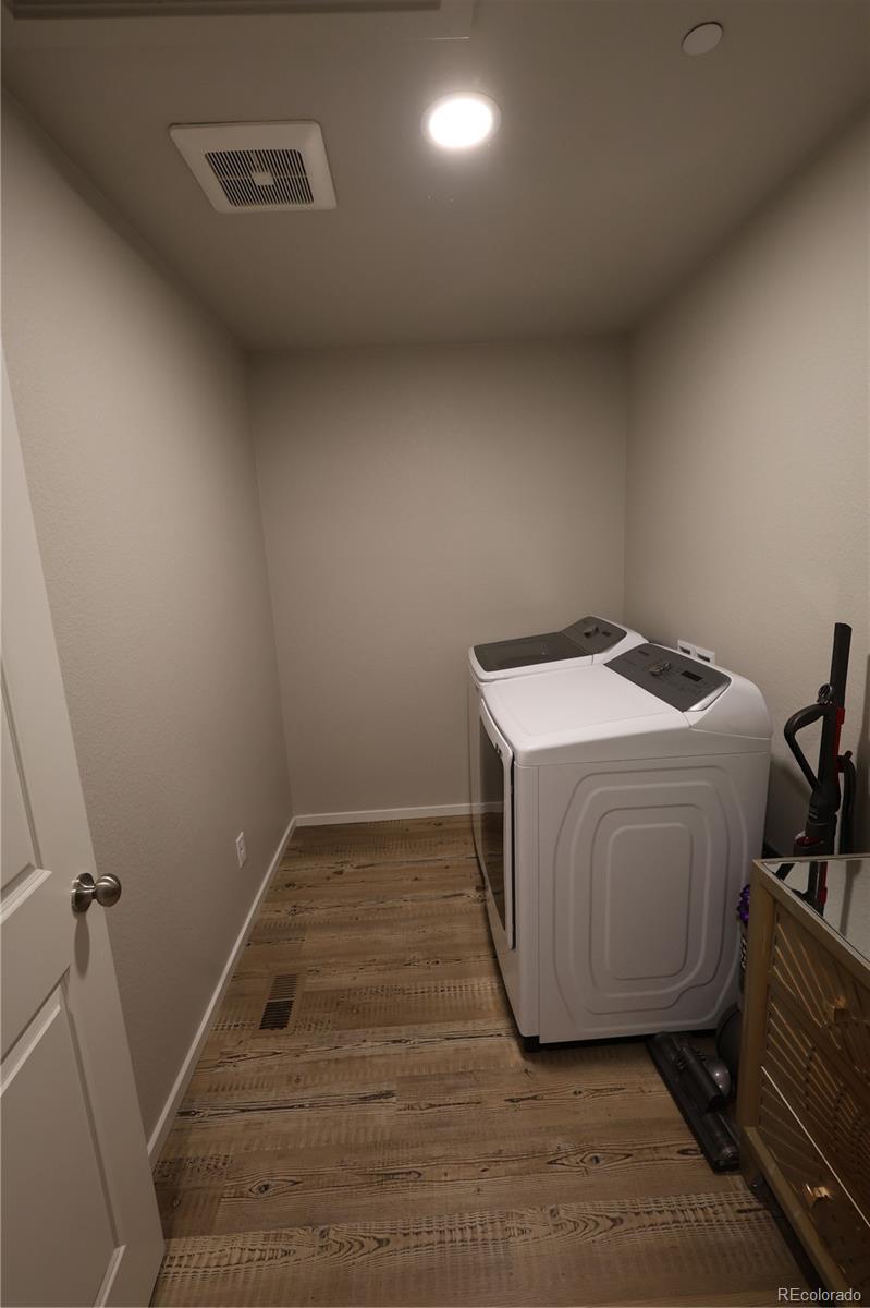 6719 4th St Road, Unit 2 Greeley, CO 80634 - Photo 15 of 23 a utility room with a washer and dryer