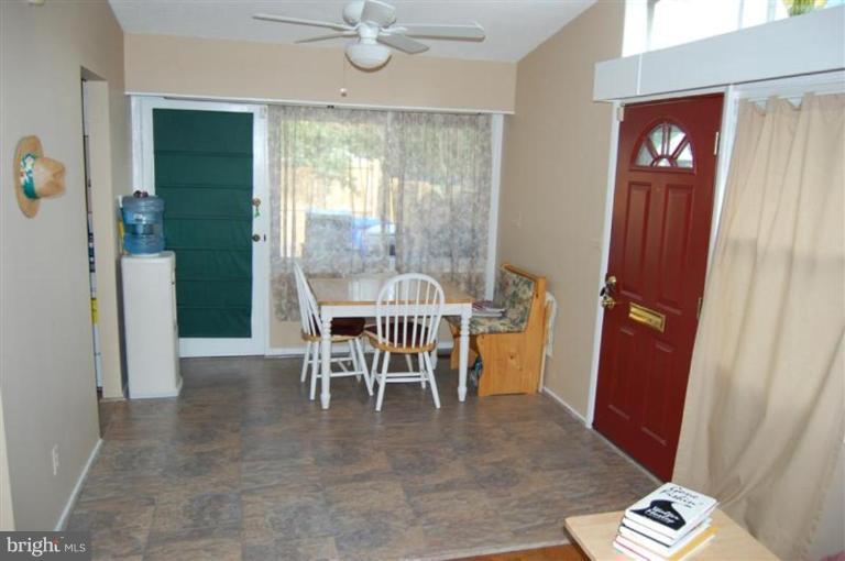 601 Kerwin Road Silver Spring, MD 20901 - Photo 5 of 13 a view of a livingroom with furniture and window