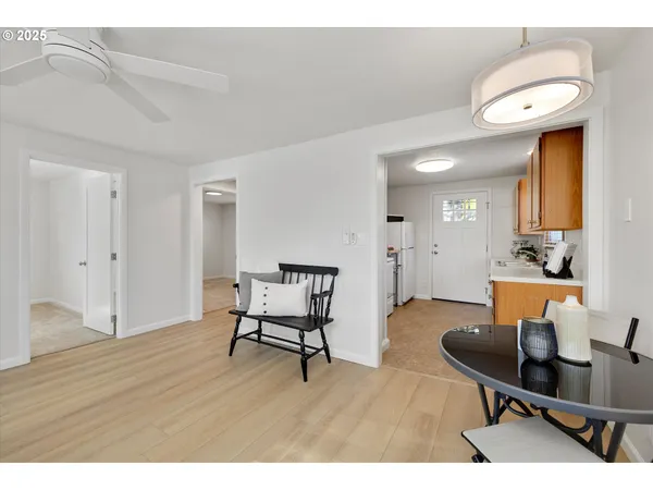 a workspace with furniture and wooden floor