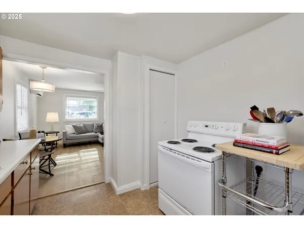 a kitchen with a stove and cabinets