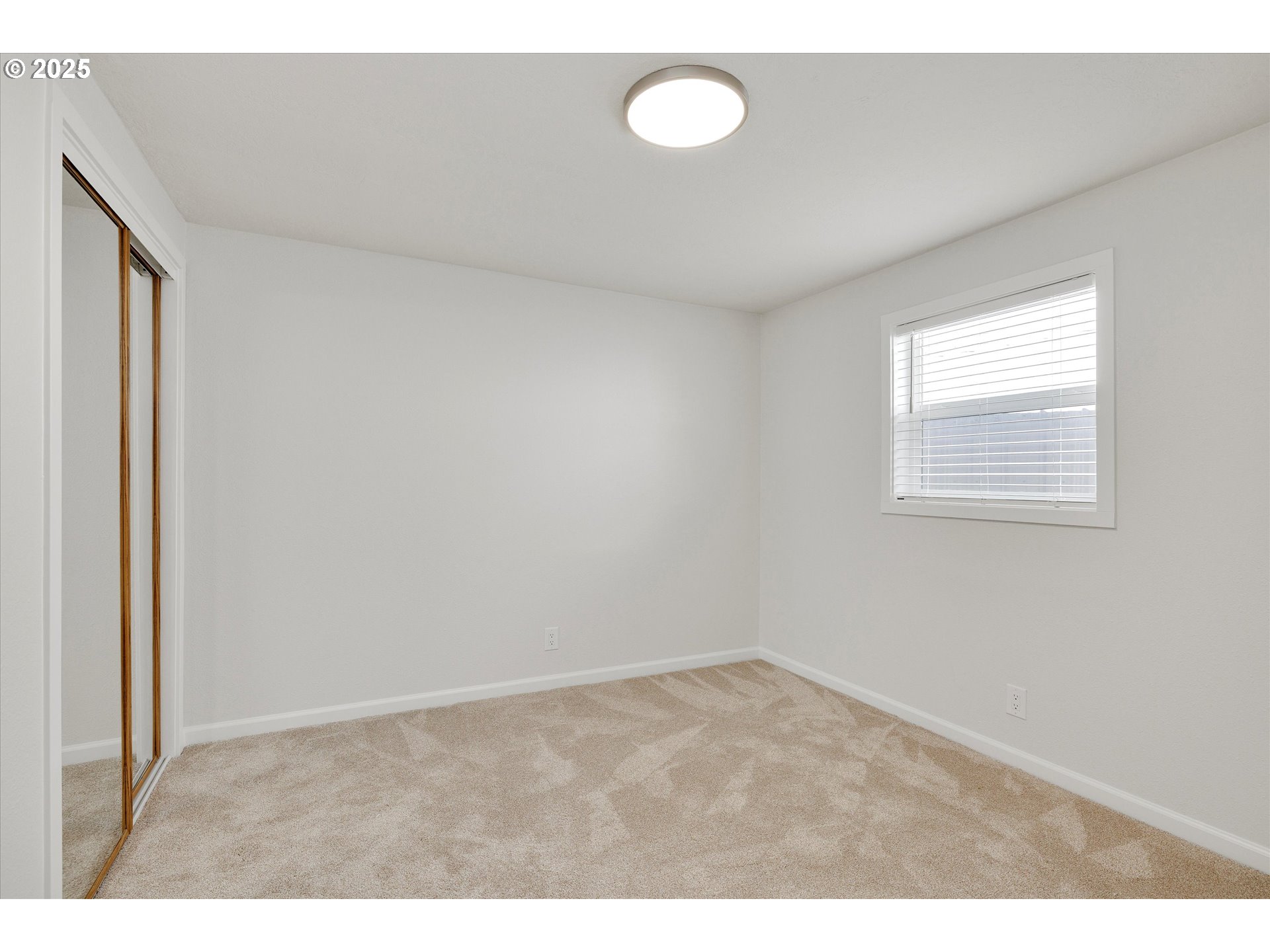 18149 Southeast Pine Street Portland, OR 97233 - Photo 21 of 36 a view of an empty room with a window