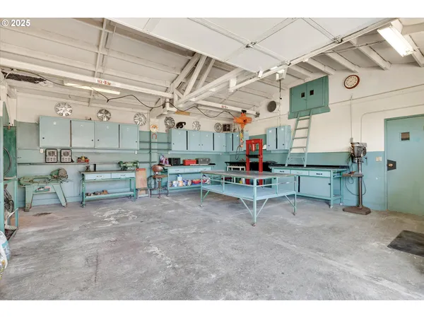 a room with lots of furniture and clutter