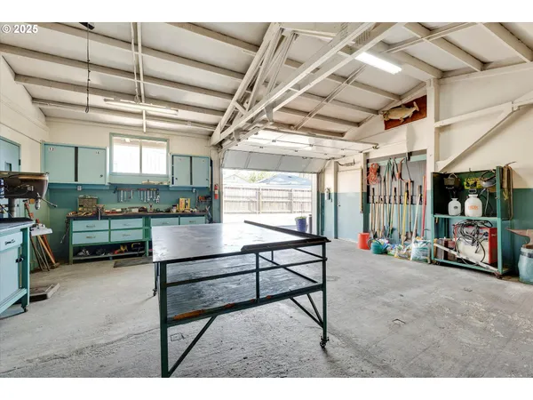 a outdoor space with lots of furniture and clutter