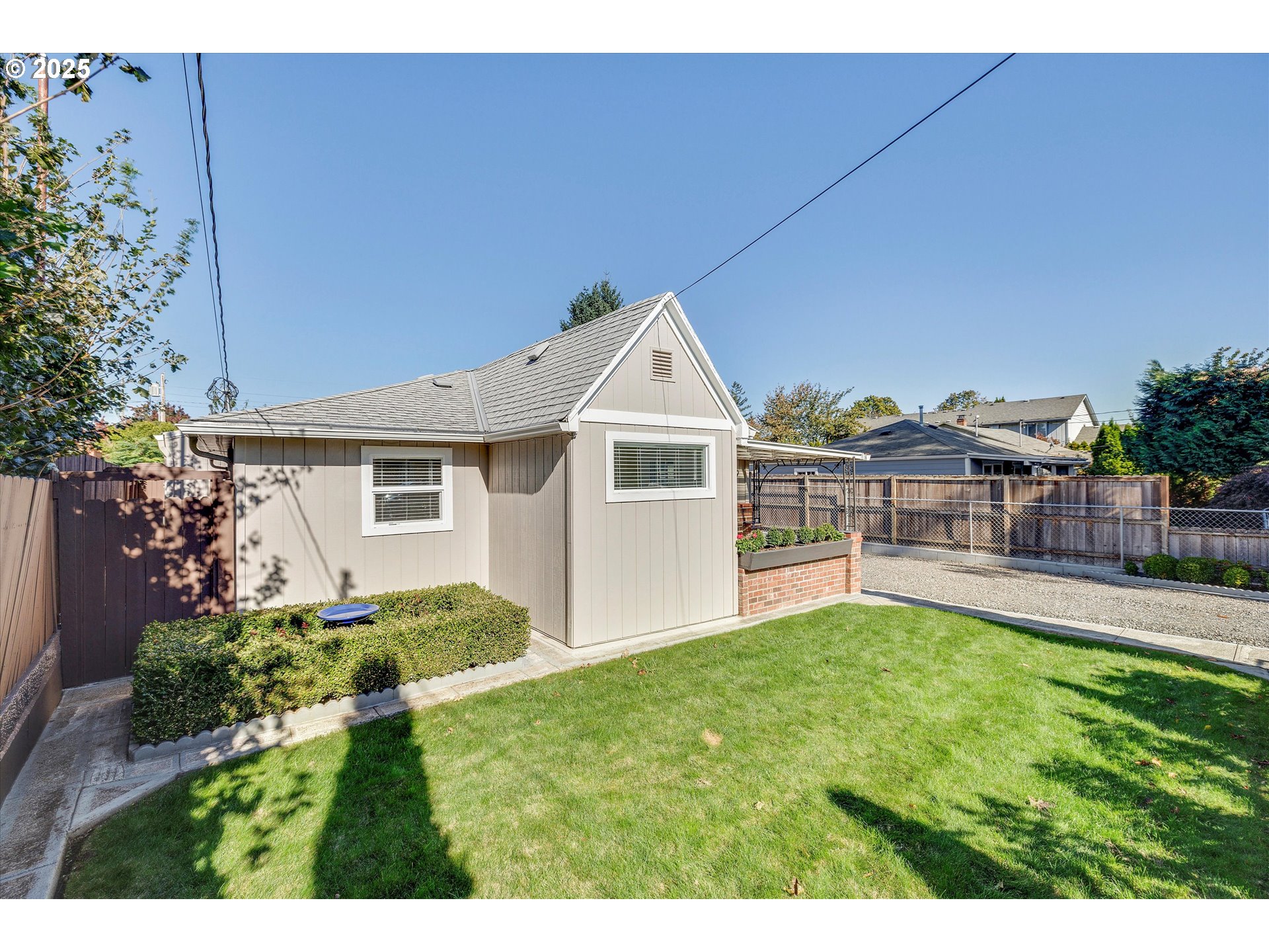 18149 Southeast Pine Street Portland, OR 97233 - Photo 3 of 36 a view of a house with a yard and sitting area