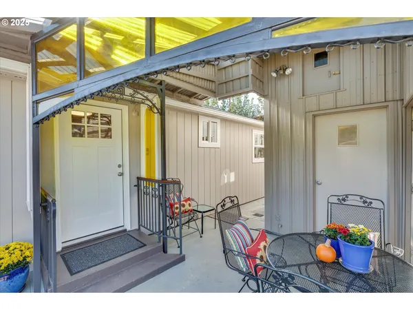 a view of a patio with furniture