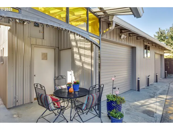 a bathroom with a sink mirror and toilet
