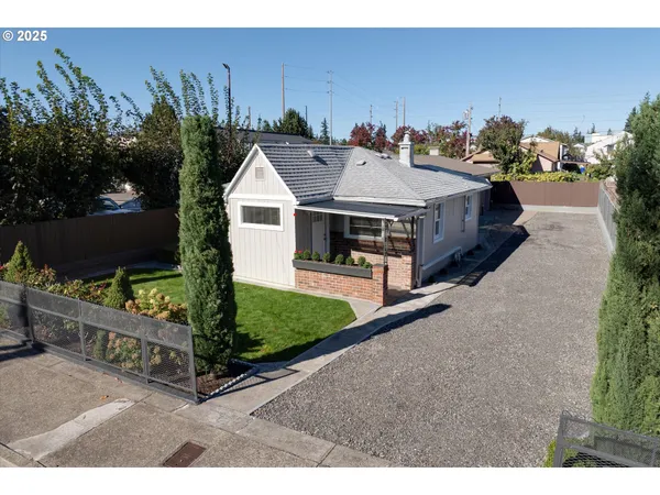 a aerial view of a house having yard