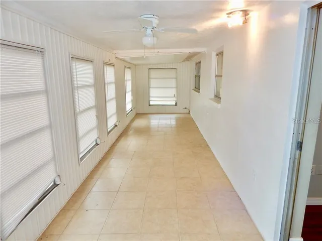 a view of gallery with windows